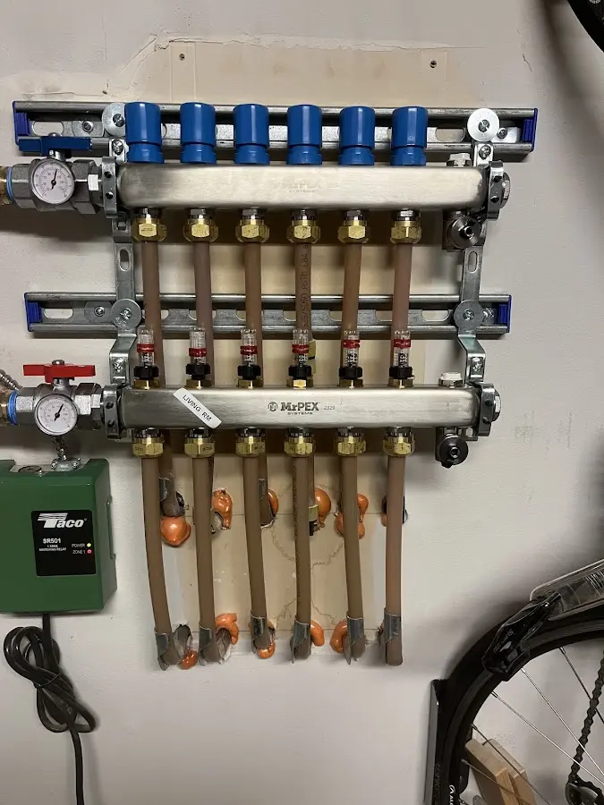 Plumber performing Water Heater Repair at a residential property in Lake Barrington